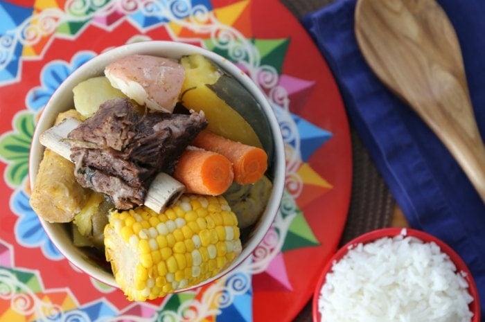 Costa Rican Vegetable Beef Stew with beef, corn, carrots, and potatoes.