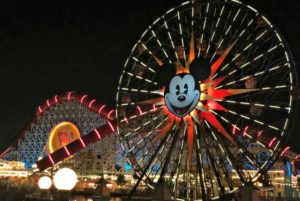 Lit up Mickey Mouse ferris wheel at Pixar Pier Disneyland.