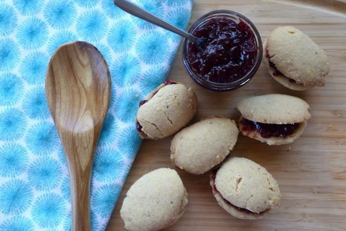 half dozen finnish spoon cookies with jar of jam