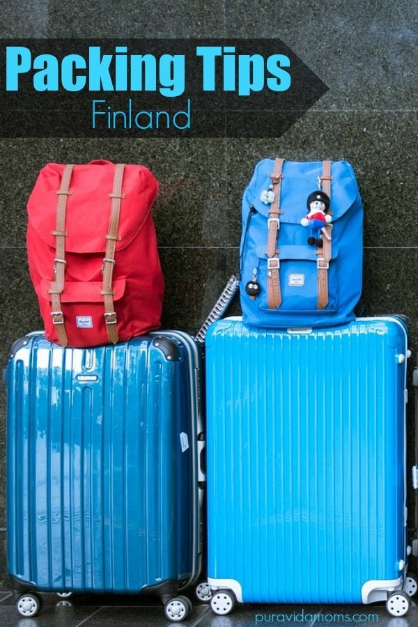 Suitcases in airport - blue and read