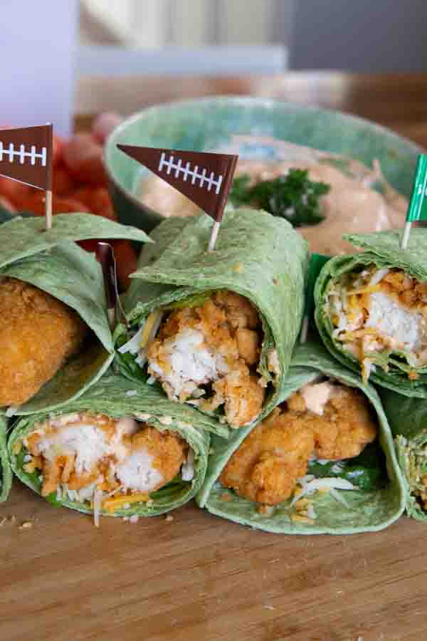 buffalo ranch crispy chicken wraps piled on top of each other for game day