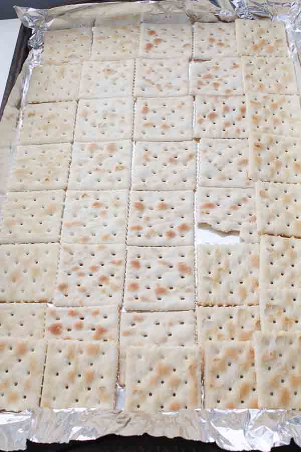 saltine crackers on jelly roll pan