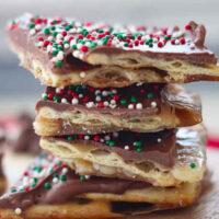 a stack of Christmas crack on a serving plate.