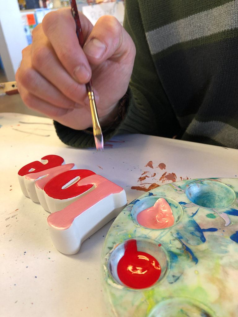 painting ceramic love at craft cabin