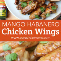 Mango chicken wings with veggies and sauce on the side.