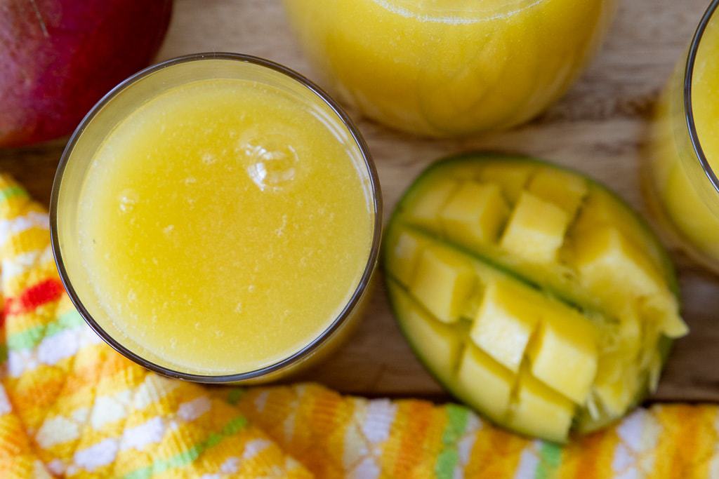 Close-up of a glass of mango juice.