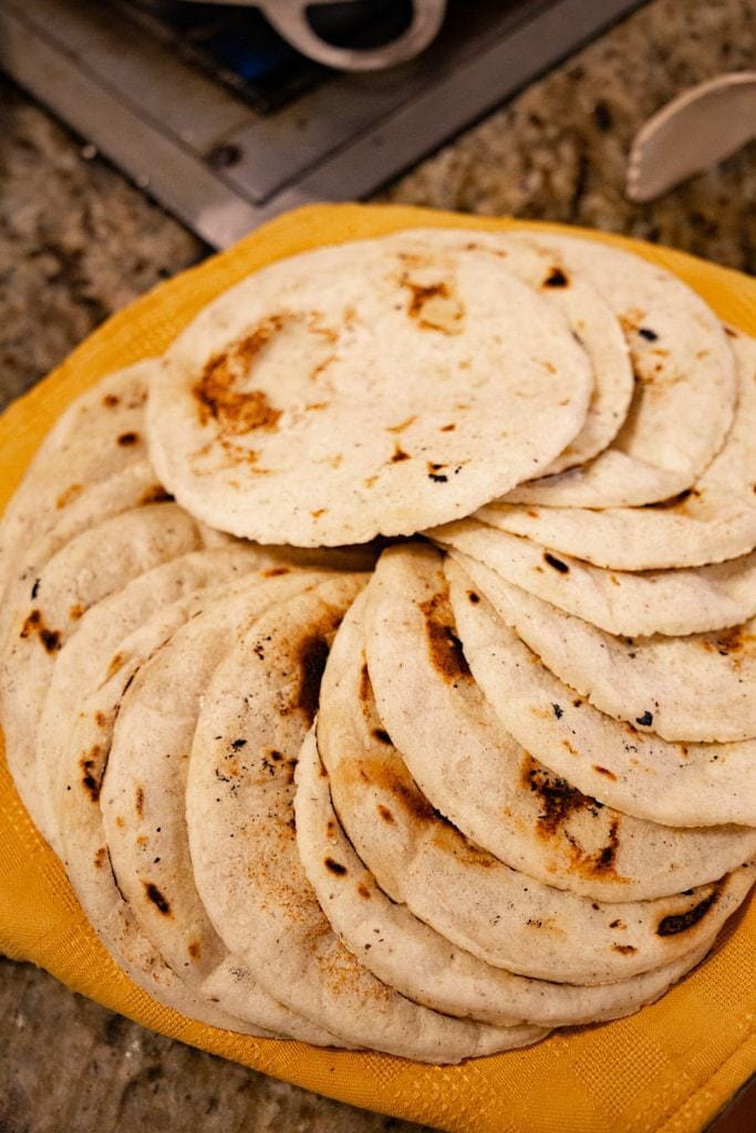 Tortillas laid out on top of each other in a circle.
