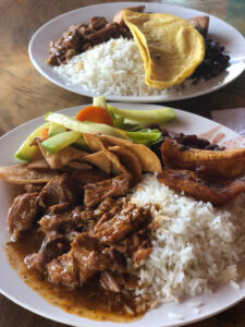 two dishes of costa rican casado.